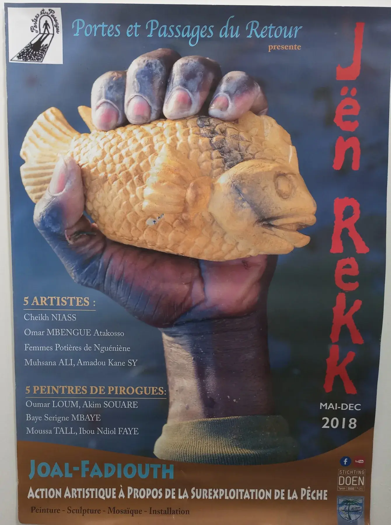 Affiche « Jen Rekk » illustrée d’un poisson, présentée dans le salon.